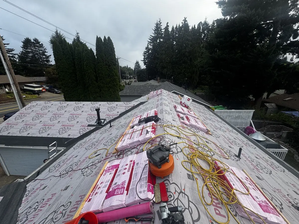 Mistletoe Construction roof replacement in progress with underlayment and staged shingles, Douglas County Oregon